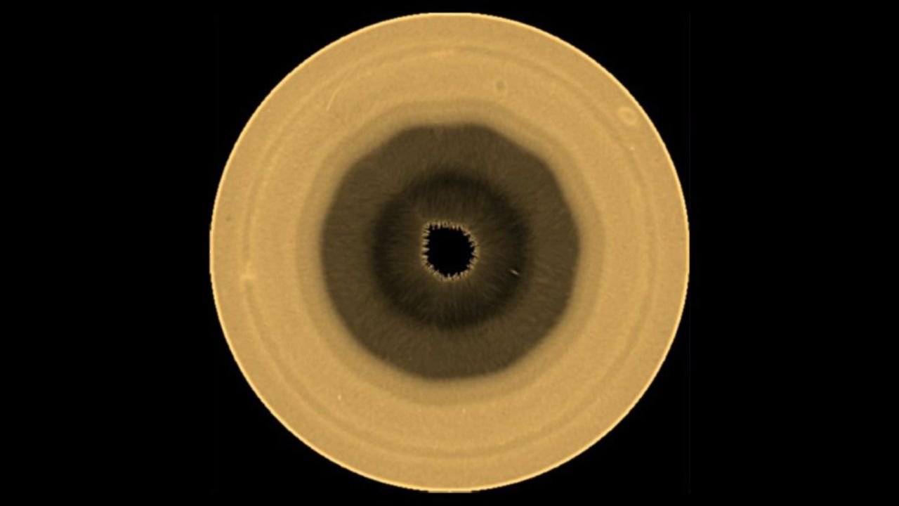 Hubble Tracks a 10 Sided Wave Over Saturn's South Pole That Researchers Cannot Yet Explain