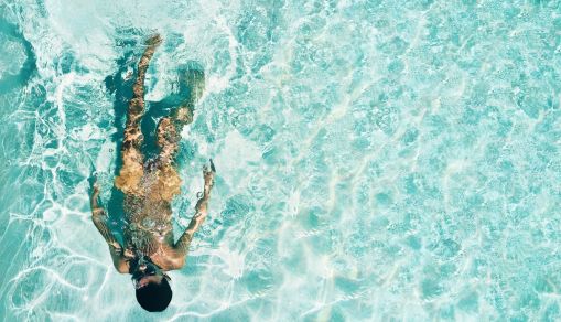 Man Snorkeling Under Water
