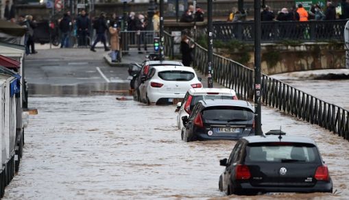 Cars submerge by water in flooded streets of Bayonne, southwestern France