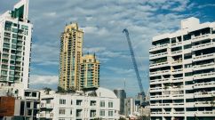 a group of tall buildings sitting next to each other (Bangkok, Thailand)
