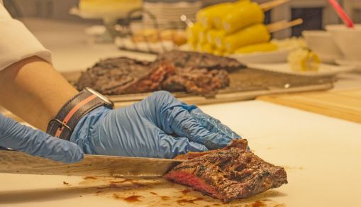 The chef cutting the meat